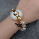 12mm Sea Shell Pearl Bracelet with 35x43mm Quartz Slice Cz Pave Insect Charm