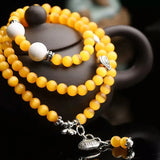 Yellow Cat Eye Stone Bracelet with Tibetan Silver Pendant
