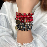 Yumfeel Bohemia Vintage Feather Tassel Bracelet Set