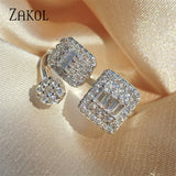 Geometric Square Open Rings with Zircon Inlay