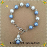 Glass Pearl Rosary Bracelet with Wing Pendant