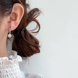E6016 Light Sterling Silver Smiling Face Ear Buckle