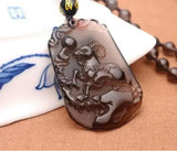 Pendentif mouton en obsidienne sculpt?e ? la main