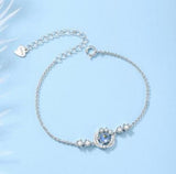 Women's Silver Feather Pendant Necklace and Bracelet Set