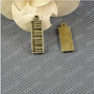 100pcs Antique Bronze Plated Piano Charms Pendants for Jewelry Making