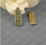 100pcs Antique Bronze Plated Piano Charms Pendants for Jewelry Making