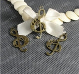 100pcs Antique Bronze Plated Musical Notation Charms Pendants