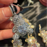 Zircon bear earrings set with pink gem