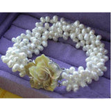 4-Row 7mm Rice Freshwater Pearl Bracelet Shell Flower Clasp