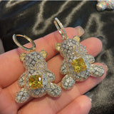 Zircon bear earrings set with pink gem