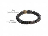 Hand Carved Ebony Bracelet with Unique Brass Charm