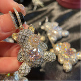 Zircon bear earrings set with pink gem