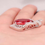 Large Oval Zircon Pendant with Inlaid Zircons
