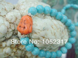 10mm Howlite Bead Orange Buddha Head Bracelet