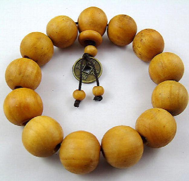 17mm Peach Wood Money Tibetan Bracelet