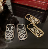 Geometric Oval Cutout Zircon Diamond Earrings