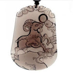 Pendentif mouton en obsidienne sculpt?e ? la main