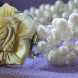 4-Row 7mm Rice Freshwater Pearl Bracelet Shell Flower Clasp