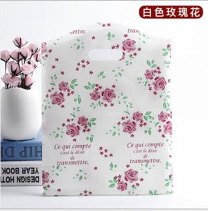 50pcs Jewelry Plastic Bag With Handles 15x20cm Boutique Gift Packaging Bag