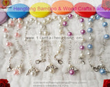 Glass Pearl Rosary Bracelet with Wing Pendant