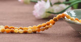 Natural Multi-tone Yellow Jade Beads 7x9mm Irregular Shape 15 Inch Strand