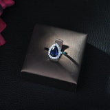 Green Crystal Tear Drop Engagement Ring with Zirconia Stones
