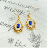 Luxury Rhinestone Earrings with Enamel Drop Glaze & Feathers