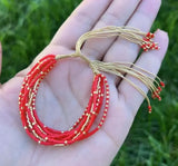 Pink Rice Bead Multi-String Drawstring Bracelet