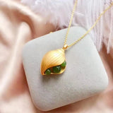 Silver Inlaid Hetian Chalcedony Conch Pendant Necklace