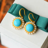 Silver Inlaid Turquoise Earrings with Pearl Accent