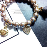 Elastic Pearl Beaded Bracelet with Crystal Love Flower