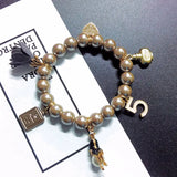 Elastic Pearl Beaded Bracelet with Crystal Love Flower