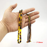 33-Bead Islam Tasbih Resin Bracelet with Tassels Yellow/Red