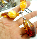 Modernist Waterdrop Golden Honey Pressed Amber Necklace