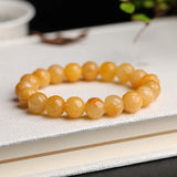 Yellow HUANGLONG Jade Carved Flower Bracelet 10mm 7.5inch